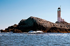 Isles of Shoals Lighthouse Sits on Rocky Island Shore in New Eng